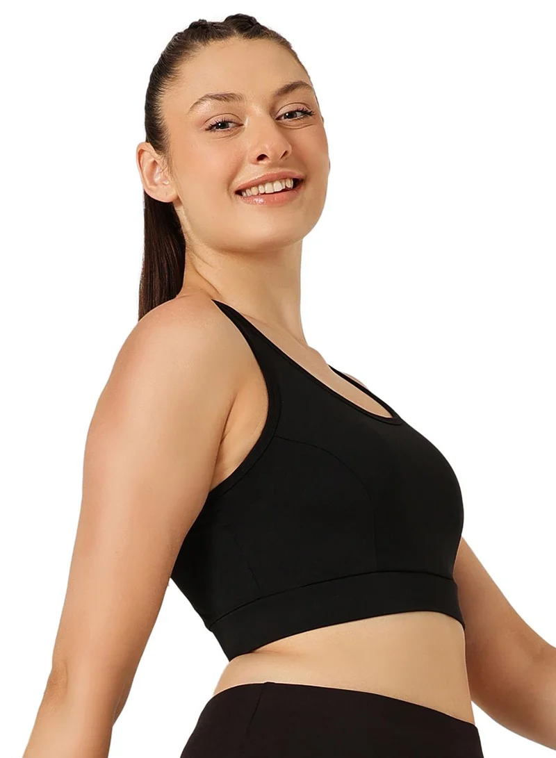 Clovia Black Medium Impact Padded Racerback Sports Bra in Black for Women | Best Price UAE